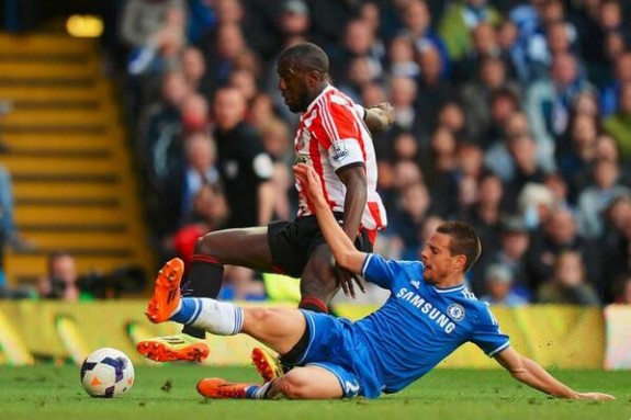Jozy Altidore goes down on the game-winning PK call Saturday against Chelsea (Mike Hewitt - Getty Images)